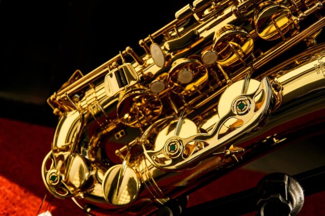 Closeup of shiny gold saxophone.