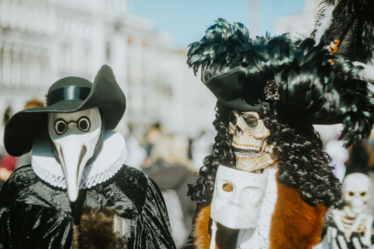 Venetian festival masks in festival parade